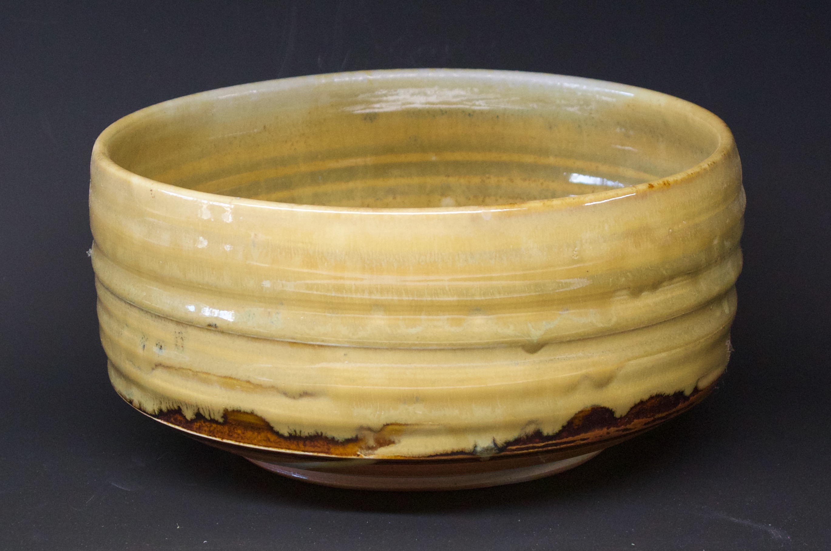 1.   Bowl with hay ash and tenmoku glaze 4"deep, 7.5" wide
$165