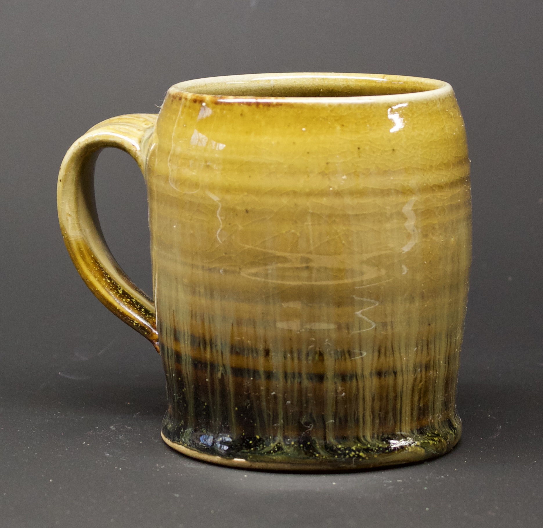 34. Mug, Tenmoku & ash glaze
4" x 4"
$50