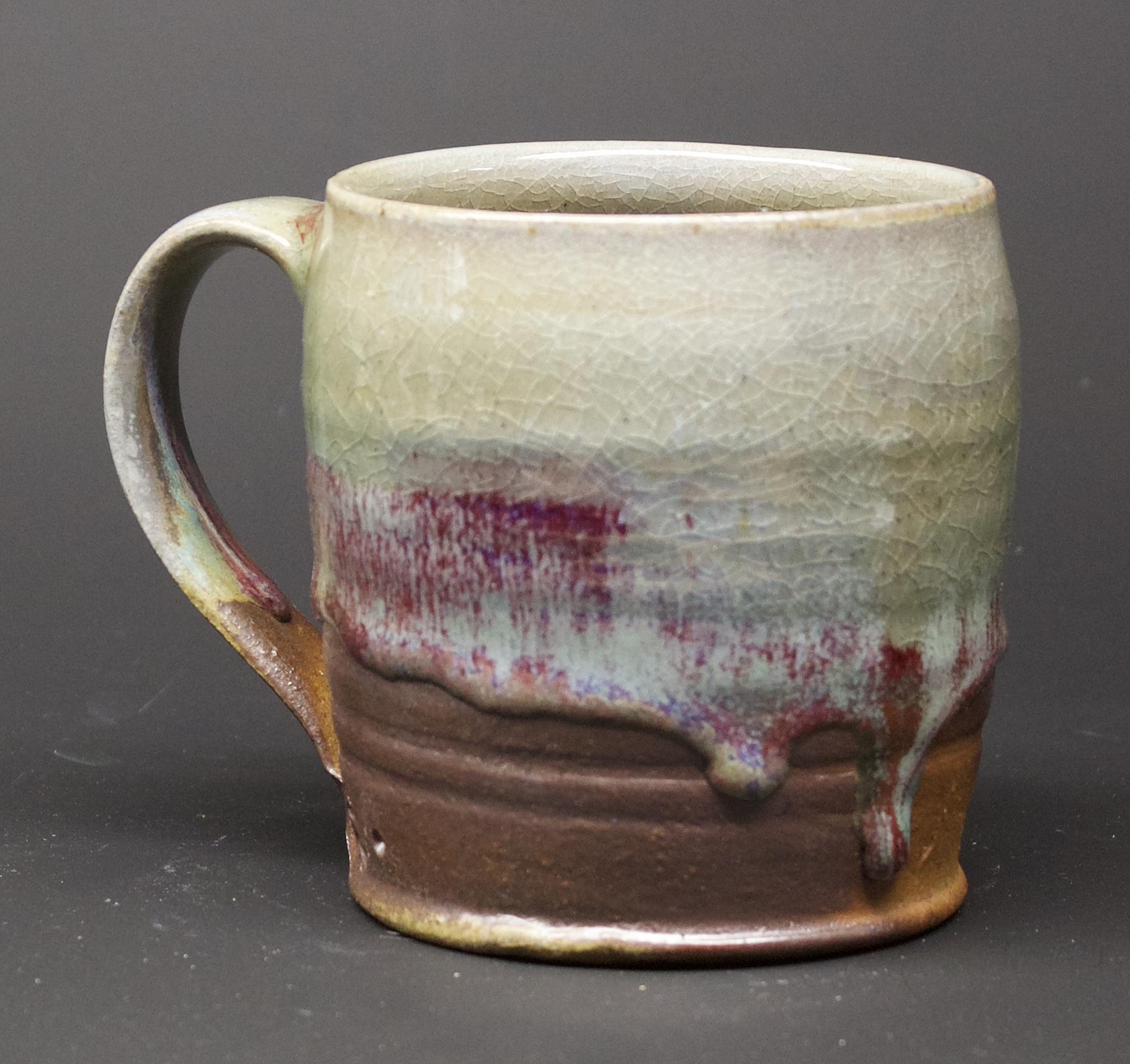 36. Mug, Oribe & red glaze
4" x 4"
$50