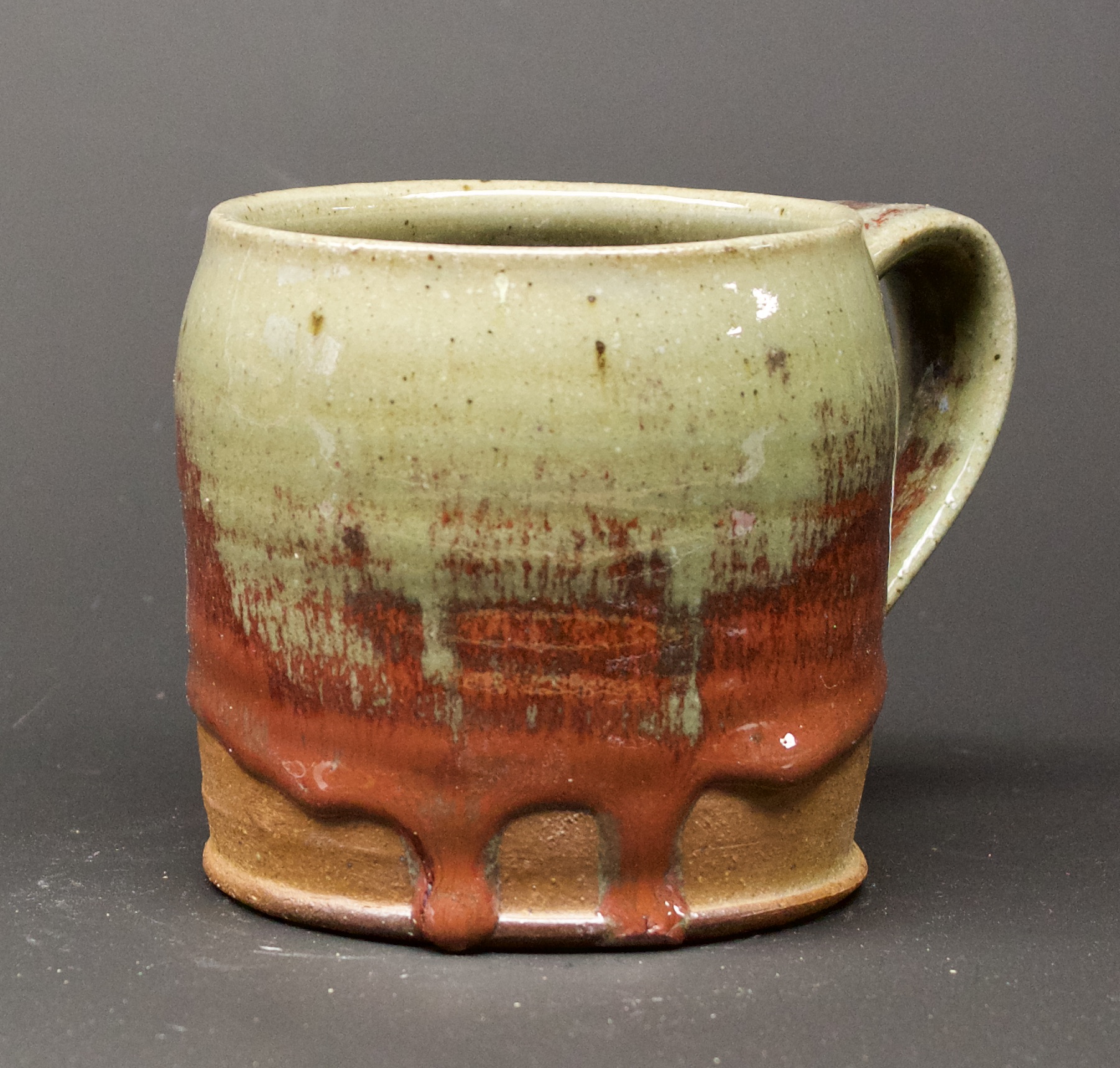 40. Mug, Oribe & red glaze
4" x 4"
$50